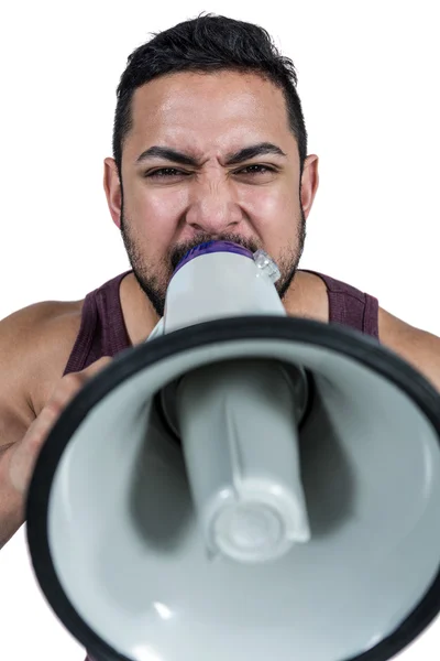Hombre gritando a través de un megáfono — Foto de Stock
