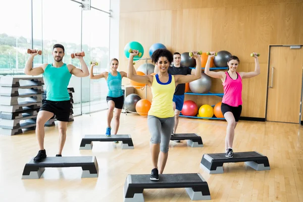 Fitness class exercising in the studio — Stock Photo, Image