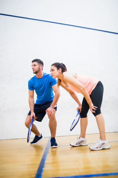 Couple tired after a squash game — Stock Photo, Image