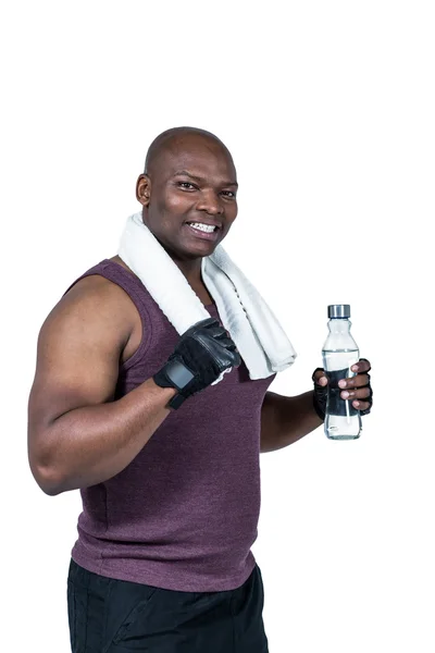 Ajuste hombre celebración de agua — Foto de Stock