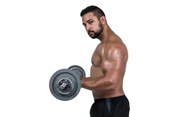 Musclé homme soulevant haltère lourd — Photo