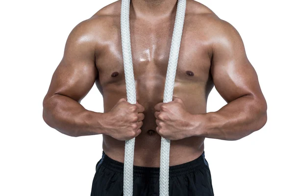 Homem muscular com corda de batalha — Fotografia de Stock