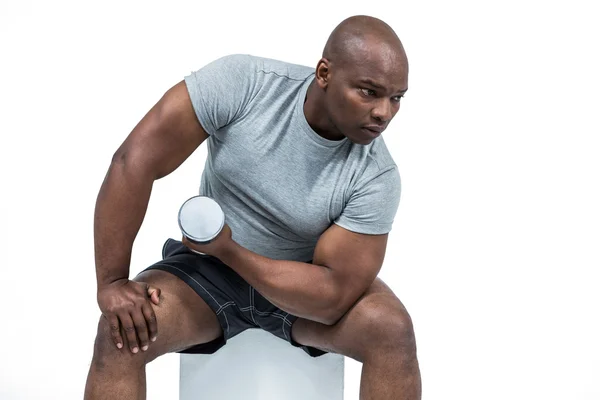 Man exercising with dumbbell — Stock Photo, Image