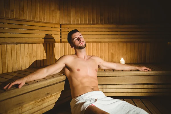 Man sitting inside a sauna — Stock Photo, Image