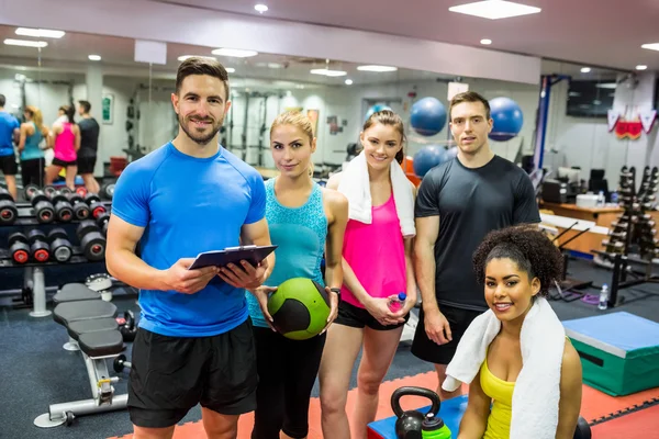 Fit people smiling at camera — Stock Photo, Image