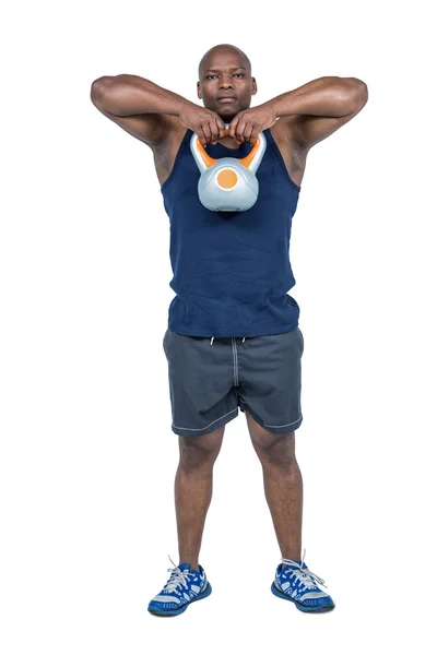 Man exercising with kettlebell — Stock Photo, Image