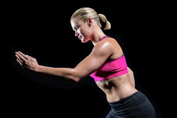 Donna muscolare che corre in abbigliamento sportivo — Foto Stock