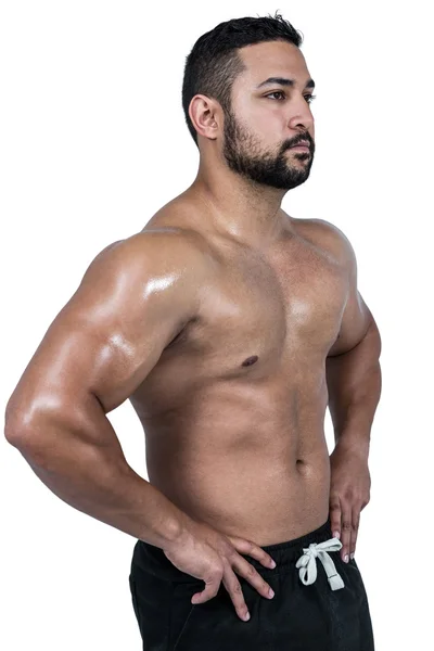 Muskulöser Mann beugt sich vor Kamera — Stockfoto