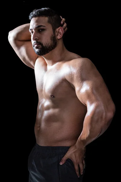 Bodybuilder uomo fiducioso — Foto Stock