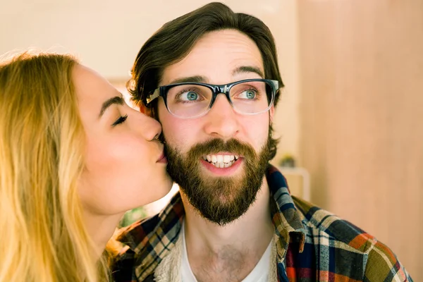 Pretty blonde kissing her co worker — Stock Photo, Image