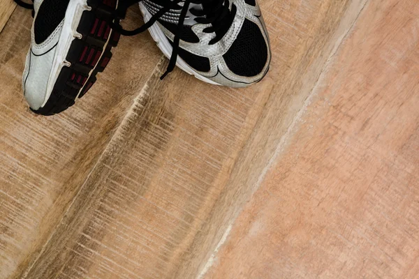 Running shoes on table — Stock Photo, Image