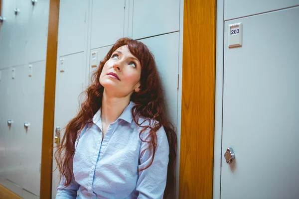 Mature student feeling stressed in hallway — Stock Photo, Image