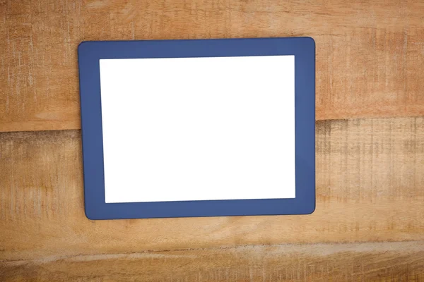 在木板上的蓝色平板电脑 — 图库照片