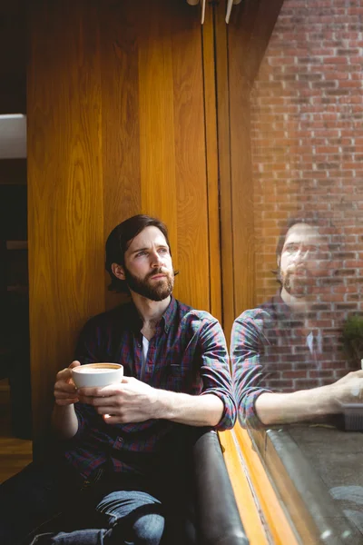 Hipster student having coffee in canteen — Stock Photo, Image