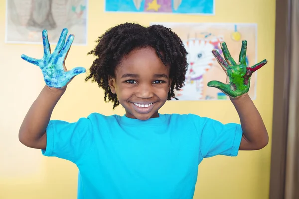 Smiling kid holding up his hands — Stock Photo, Image