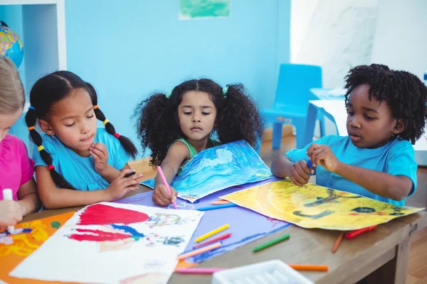 Happy kids all drawing pictures — Stock Photo, Image
