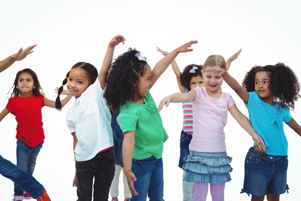 Girls standing with arms spread out — Stock Photo, Image