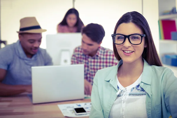 Joven trabajador creativo sonriendo —  Fotos de Stock