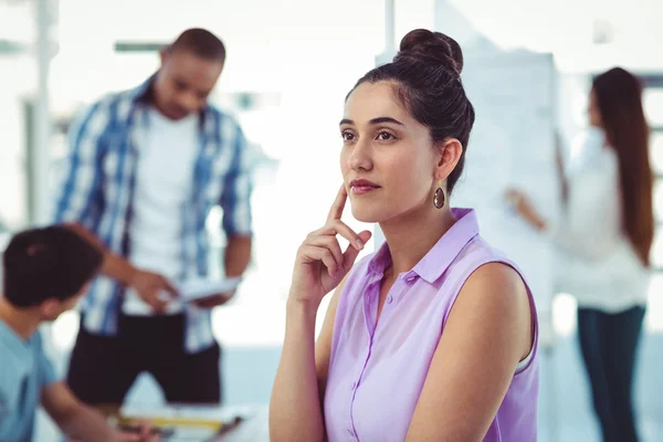 Young creative worker thinking — Stock Photo, Image