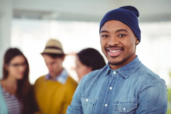 Creative team smiling at camera — Stock Photo, Image