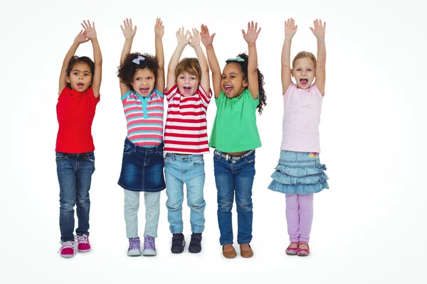 Kids standing together with arms raised — Stock Photo, Image