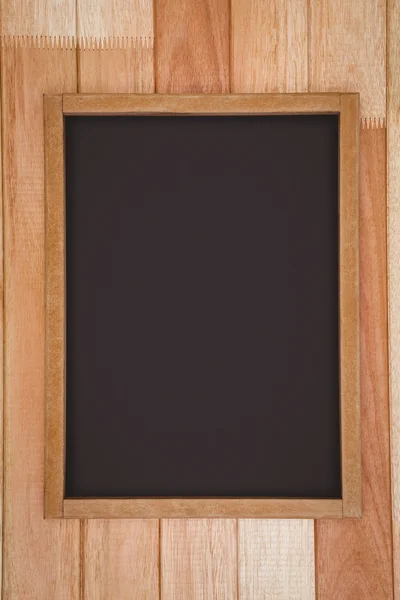Große Tafel gegen Holzplanke — Stockfoto