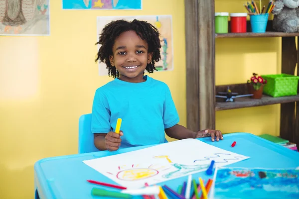 School kid drawing on a sheet — Stock Photo, Image