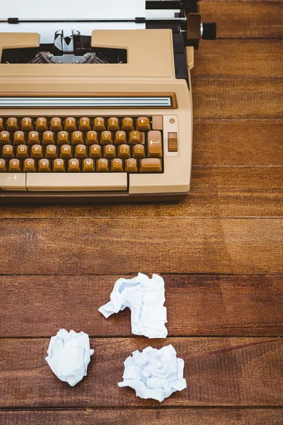 Old typewriter and paper on wood desk — Stock Photo, Image