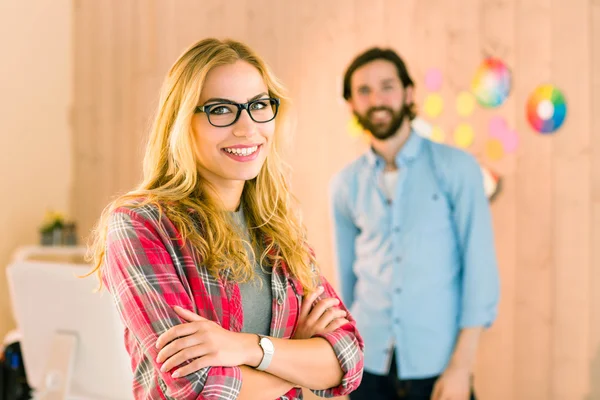 Creative team smiling at camera — Stock Photo, Image