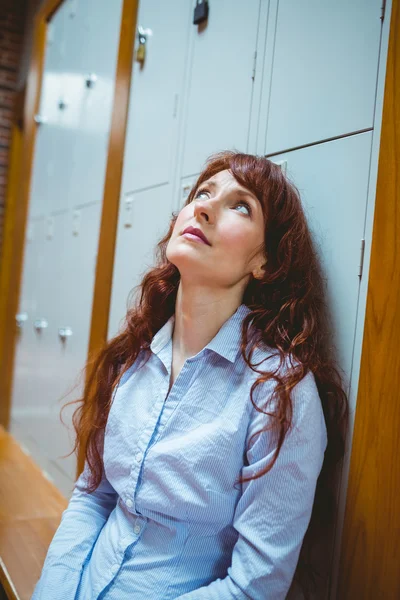 Mature student feeling stressed in hallway — Stock Photo, Image