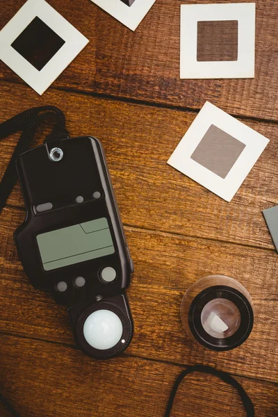 Old camera with photos slides — Stock Photo, Image