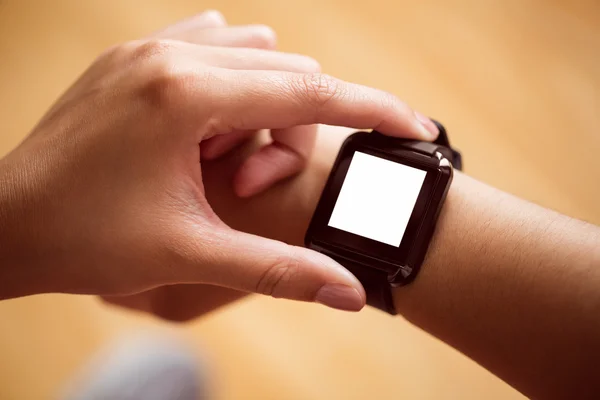 Asian woman using smart watch with copy space — Stock Photo, Image