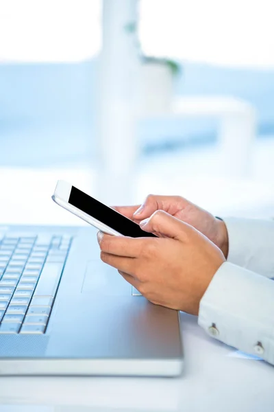Cropped image of woman using smartphone — Stock Photo, Image