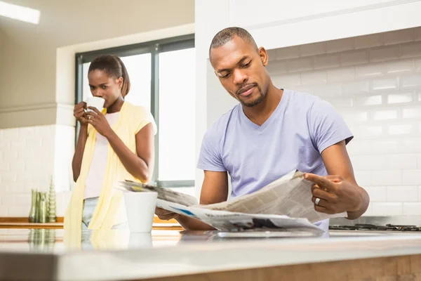 Casual happy couple having breakfast — Stock Photo, Image