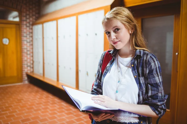 Focused student standing and studying — Stock Photo, Image