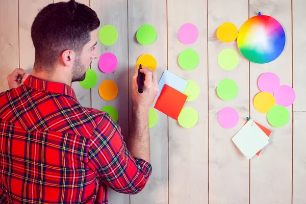 Creative worker using wall for brainstorm — Stock Photo, Image