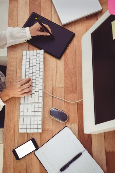 Cropped image of woman using graphics tablet — Stock Photo, Image