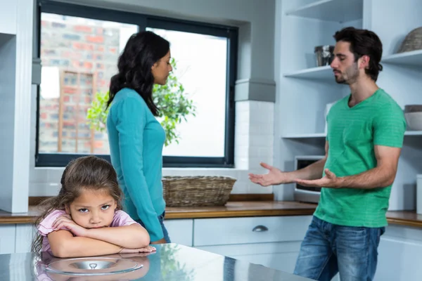 Sad child listening to parents argument — Stock Photo, Image