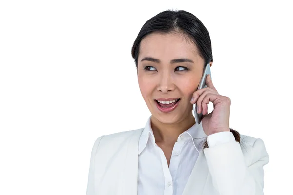 Businesswoman using her smart phone — Stock Photo, Image