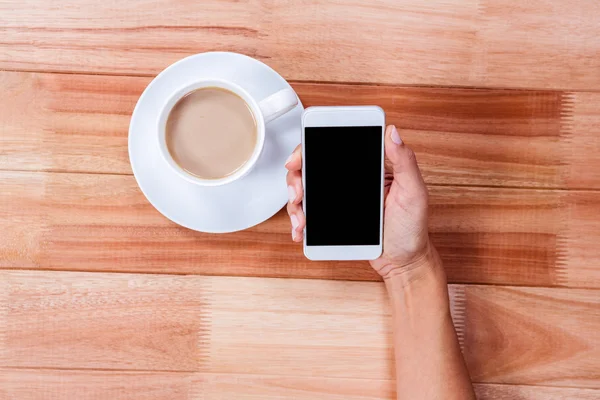 Deel van de hand met smartphone — Stockfoto