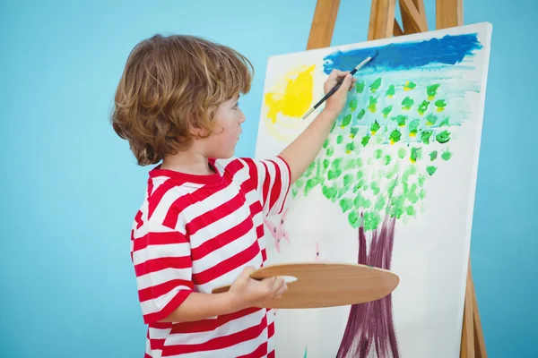 Happy boy painting his picture — Stock Photo, Image