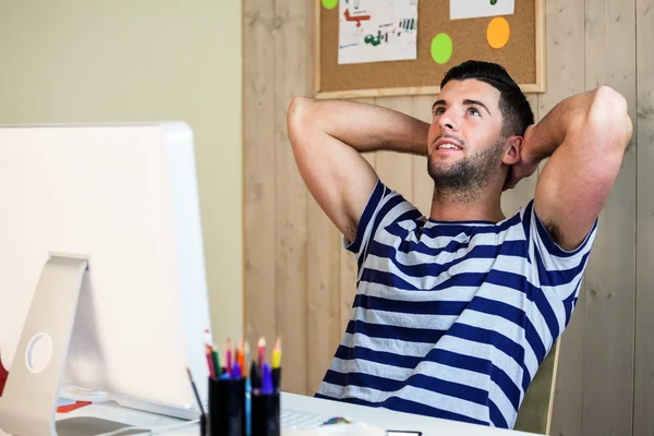 Handsome hipster working at desk — Stock Photo, Image