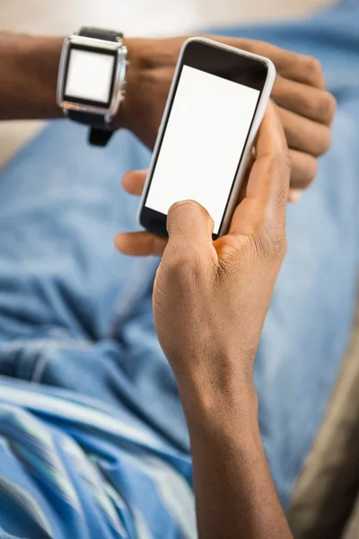 Close up view of a casual man using smart watch — Stock Photo, Image