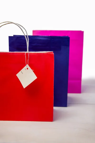 Bolsas de regalo de compras con etiquetas — Foto de Stock