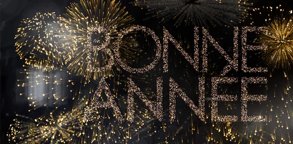 Composite image of glittering bonne annee — Stock Photo, Image