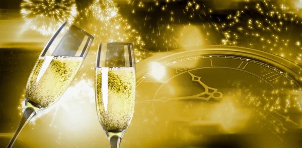 Composite image of champagne glasses clinking — Stock Photo, Image