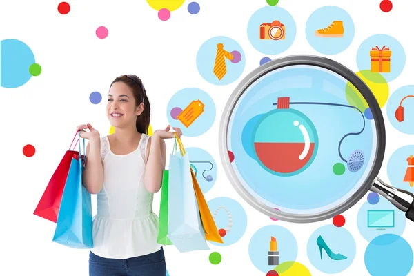 Brunette posing with shopping bags — Stock Photo, Image