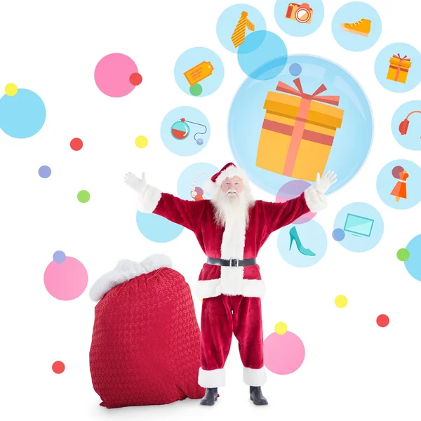 Composite image of happy santa with sack of gifts — Stock Photo, Image