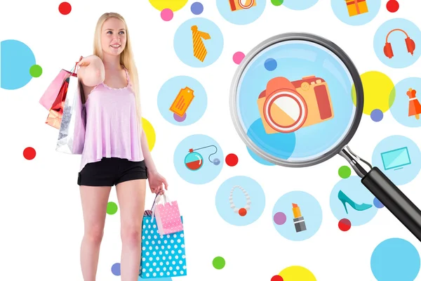 Blonde holding shopping bags — Stock Photo, Image