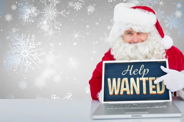 Sammansatta bilden av santa med laptop — Stockfoto